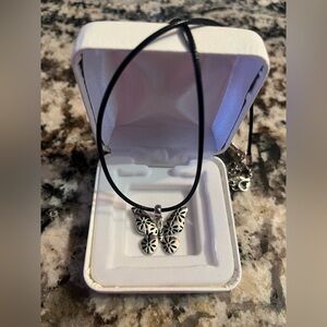 Elegant Silver Floral Butterfly Pendant Necklace on black leather cord. New.
